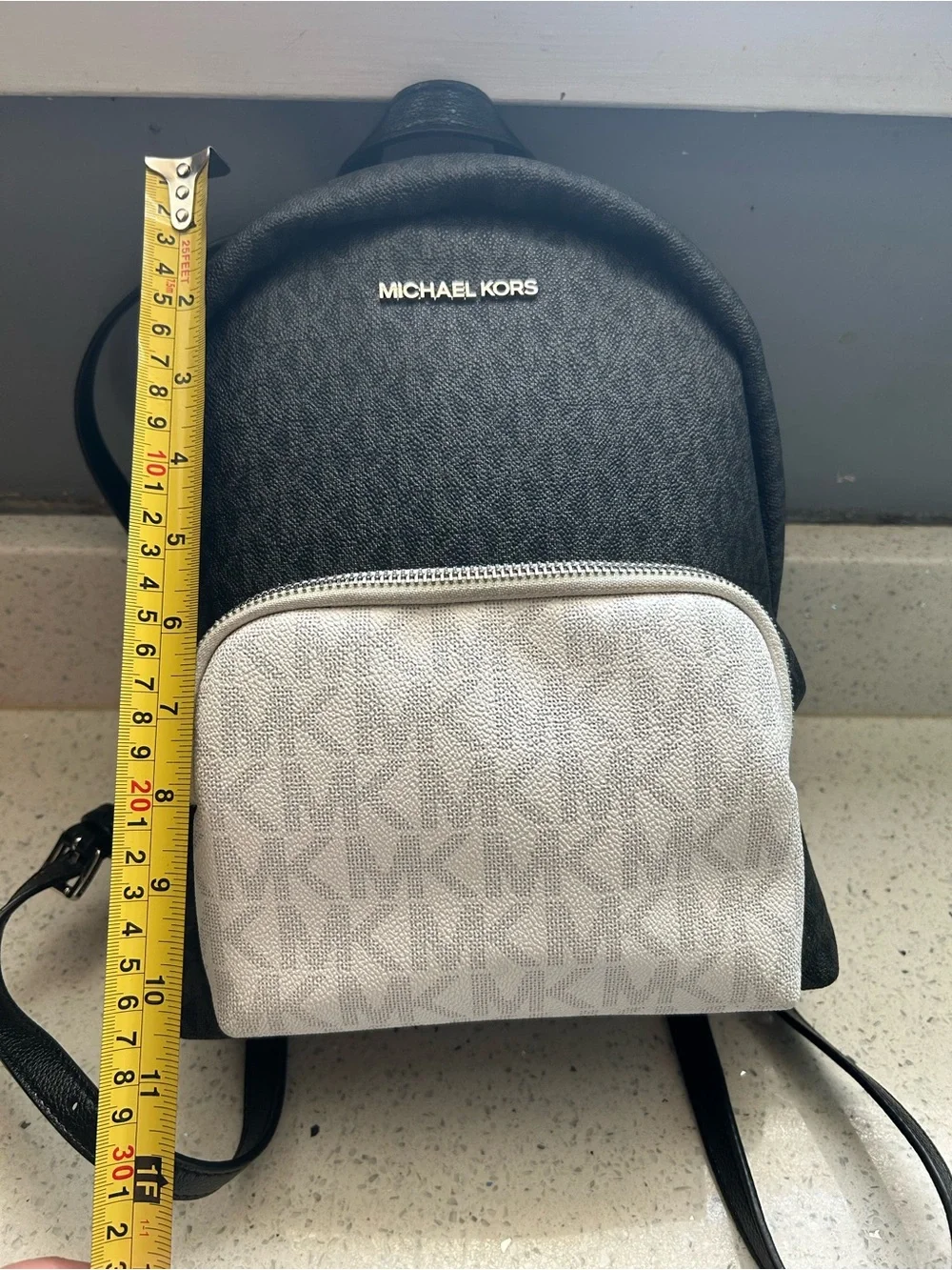 Michael Kors Black Backpack with White Front Pocket
